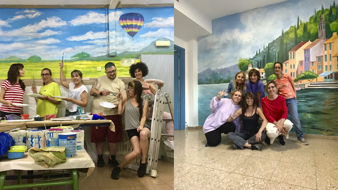 Participantes pintando un mural en un taller de arte urbano